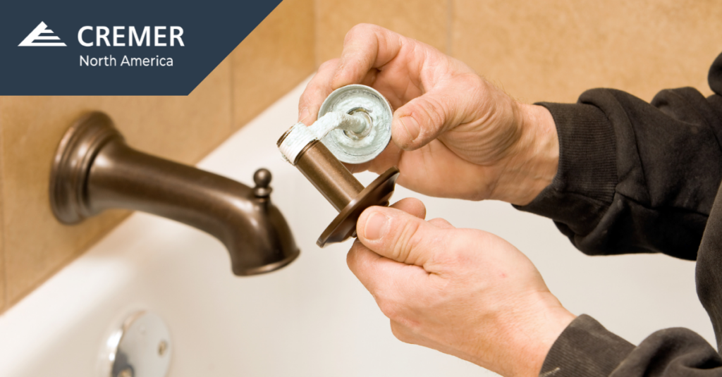 Applying adhesive sealant in plumbing fixture installation demonstrating physical form in adhesives