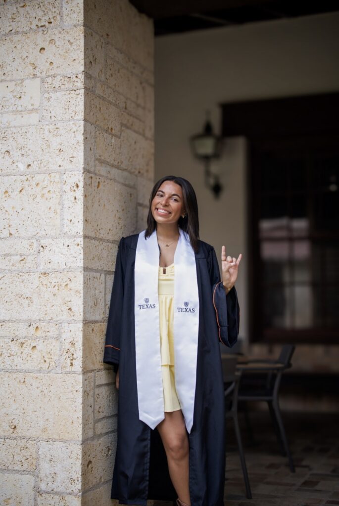 Alice, a CREMER North America Marketing Intern in her graduation cap and gown from the University of Texas at Austin. Alice has just finished her internship at CREMER North America. Photo Credit: Mariana Nannetti